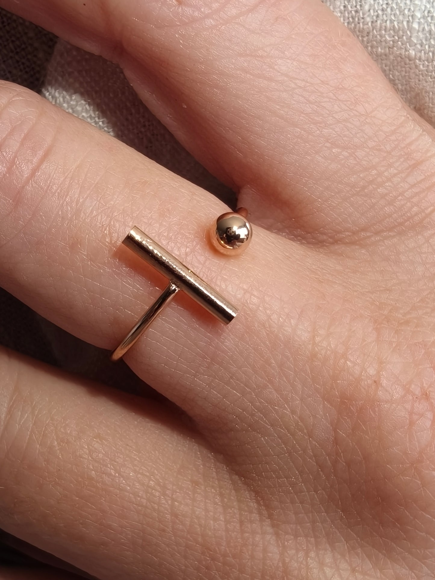 Bar and ball ring