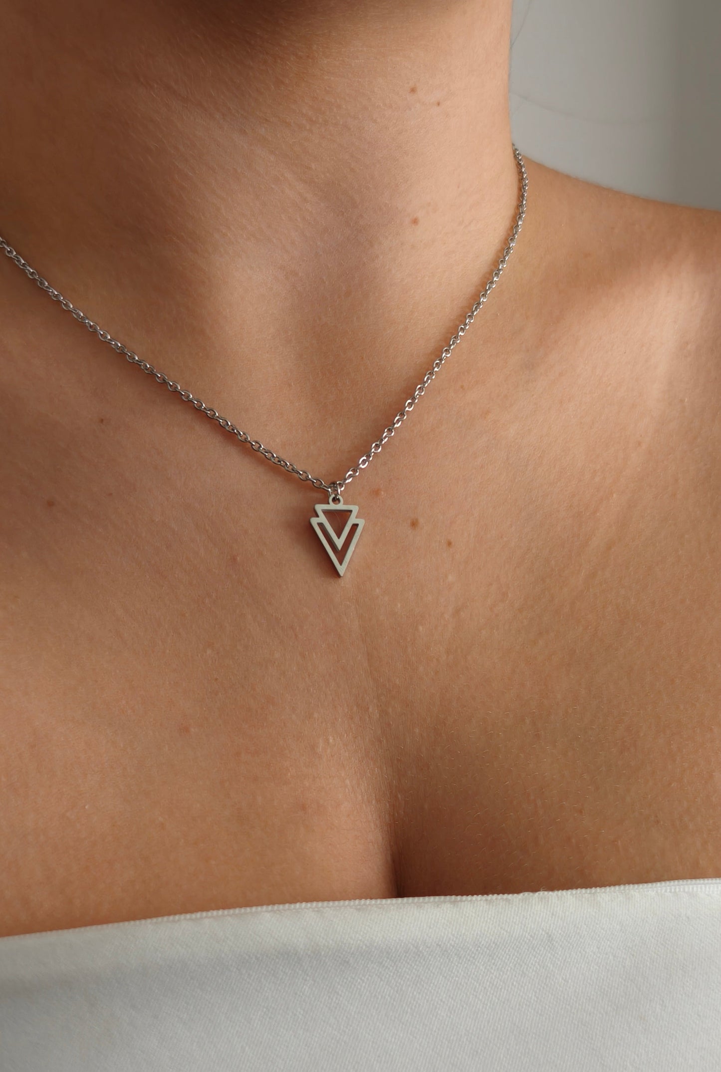 Double Hollow Triangle Pendant
